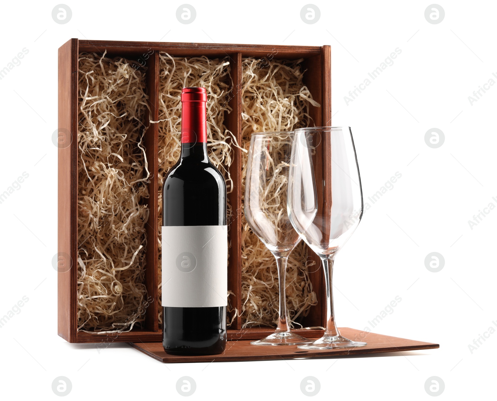 Photo of Wooden gift box, wine and glasses isolated on white