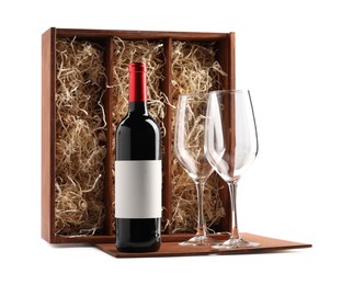 Wooden gift box, wine and glasses isolated on white