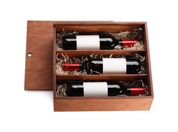 Photo of Wooden gift box with wine bottles isolated on white, above view