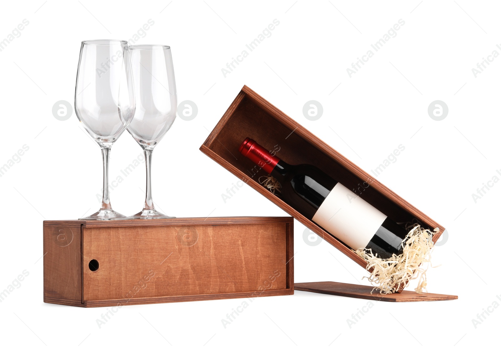 Photo of Wooden gift boxes, wine and glasses isolated on white