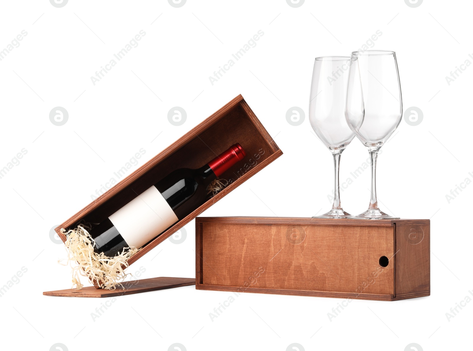 Photo of Wooden gift boxes, wine and glasses isolated on white