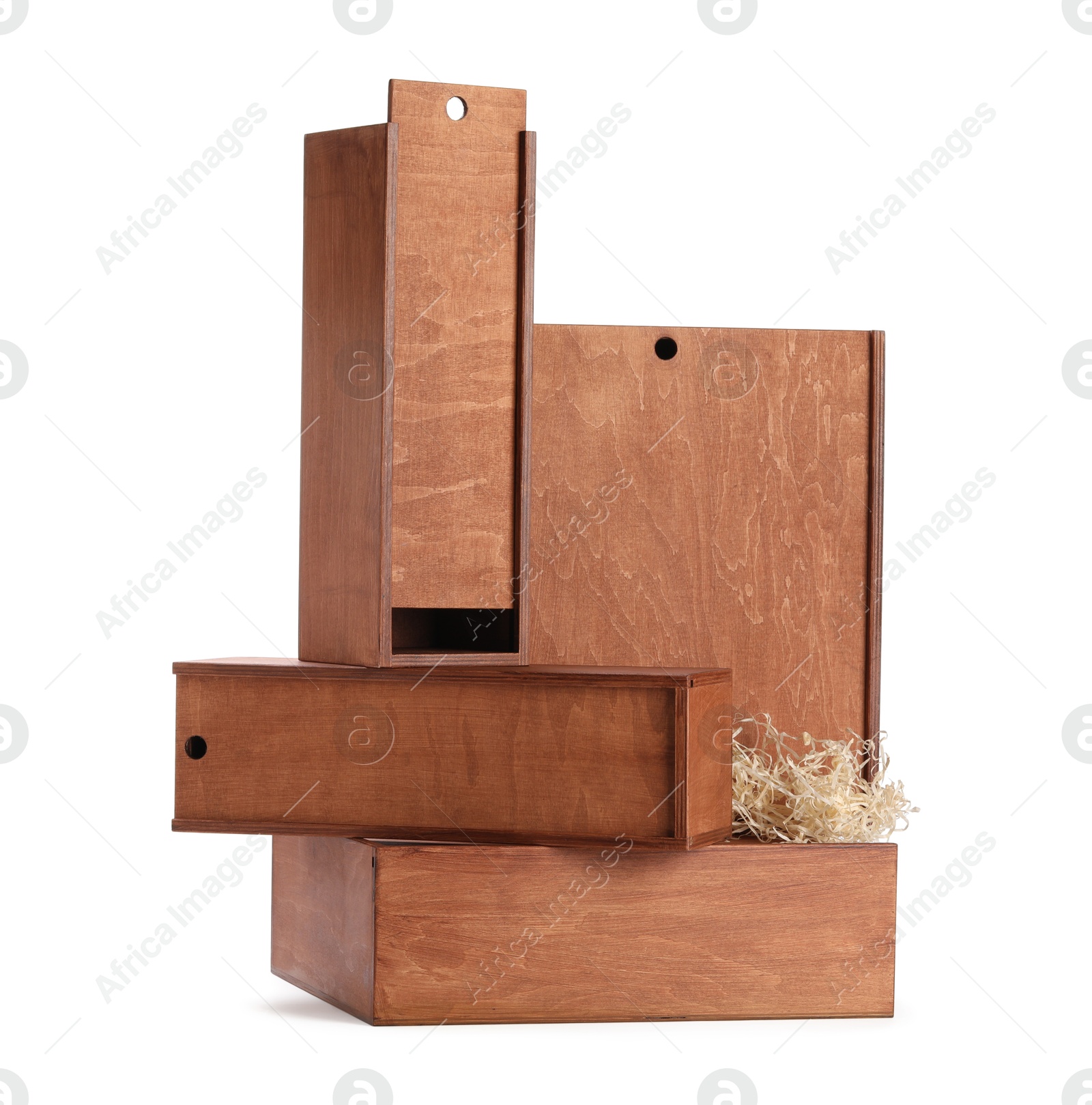 Photo of Open wooden wine boxes with straw isolated on white