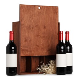 Wooden gift box with wine bottles isolated on white