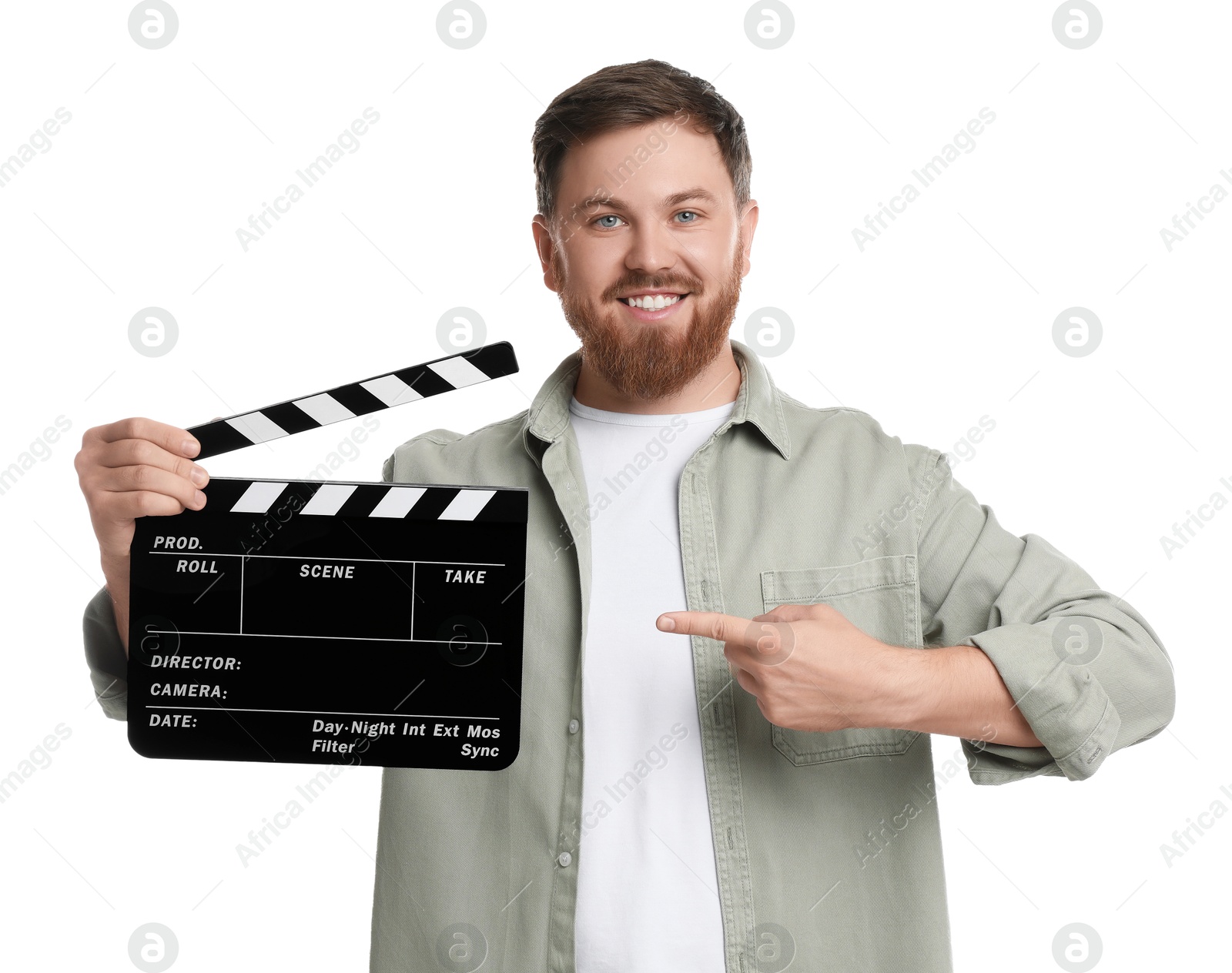 Photo of Making movie. Smiling man pointing at clapperboard on white background