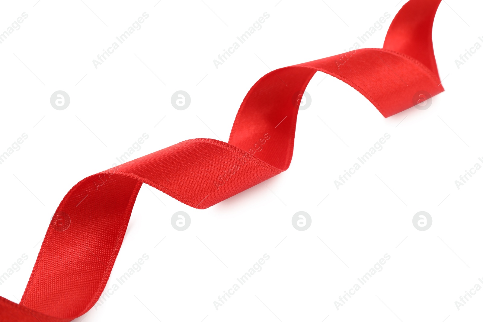 Photo of One beautiful red ribbon isolated on white