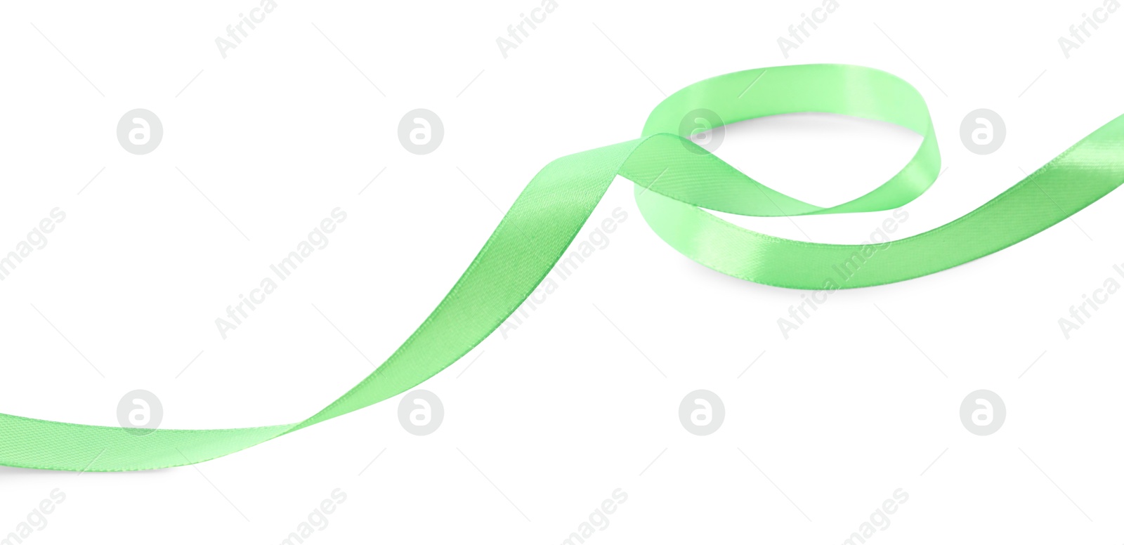 Photo of One beautiful green ribbon isolated on white