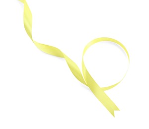 Photo of Beautiful yellow ribbon isolated on white, top view