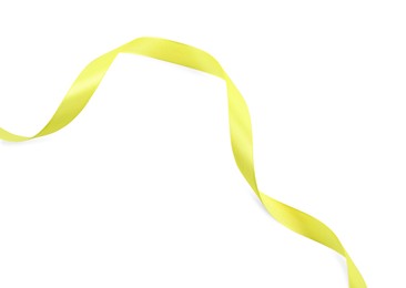 Beautiful yellow ribbon isolated on white, top view