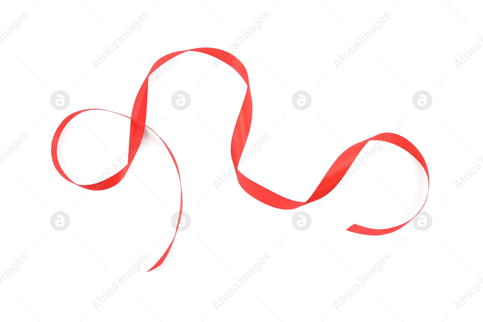 Photo of Beautiful red ribbon isolated on white, top view