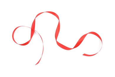 Photo of Beautiful red ribbon isolated on white, top view