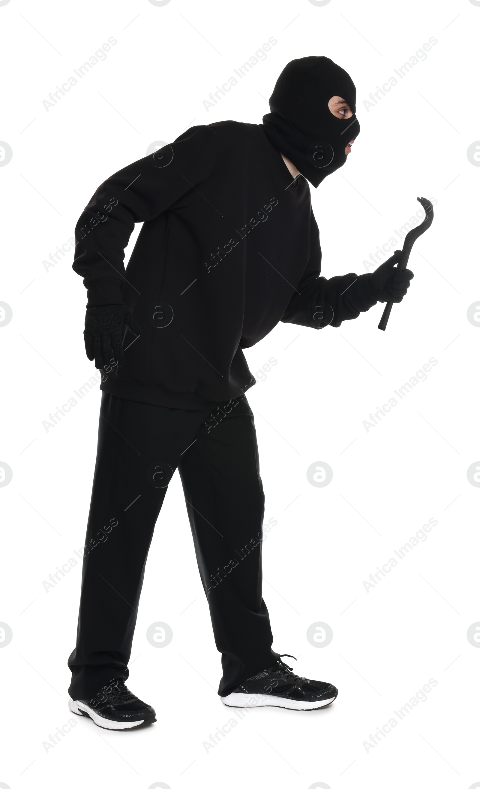 Photo of Thief in balaclava with crowbar on white background