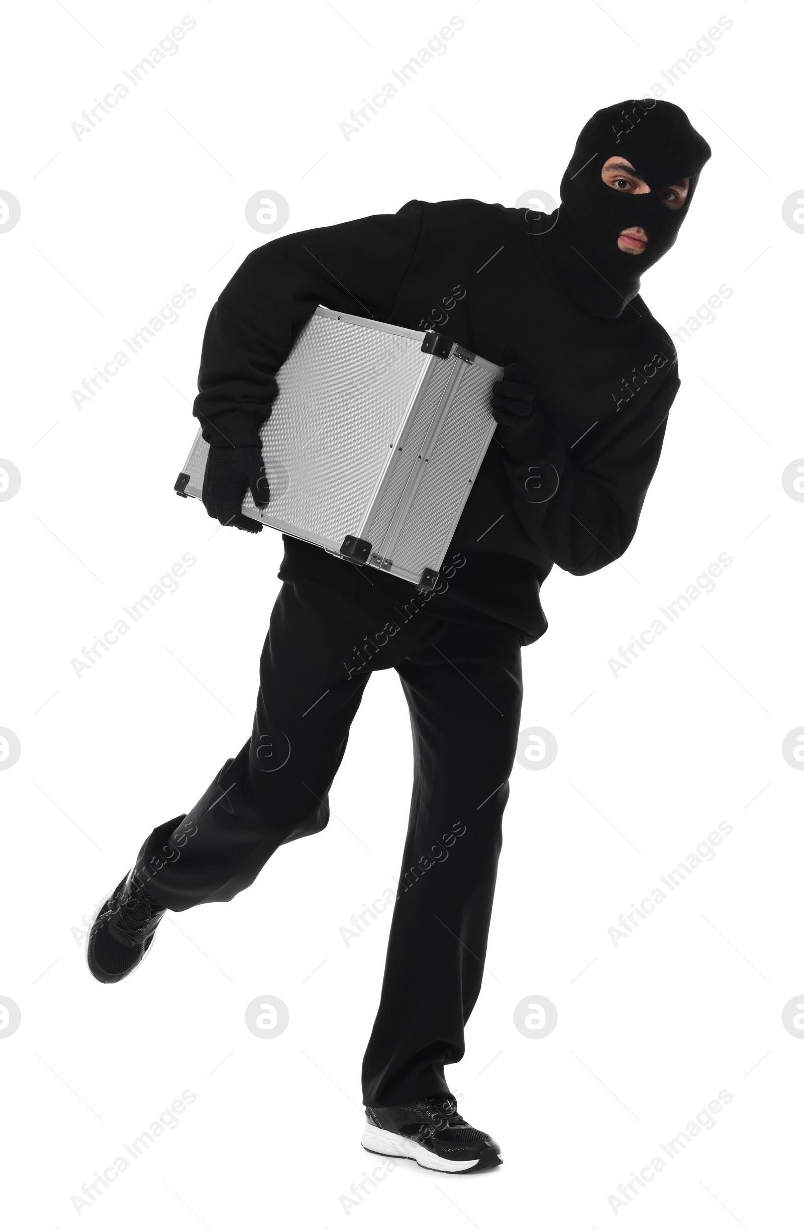 Photo of Thief in balaclava running with briefcase of money on white background