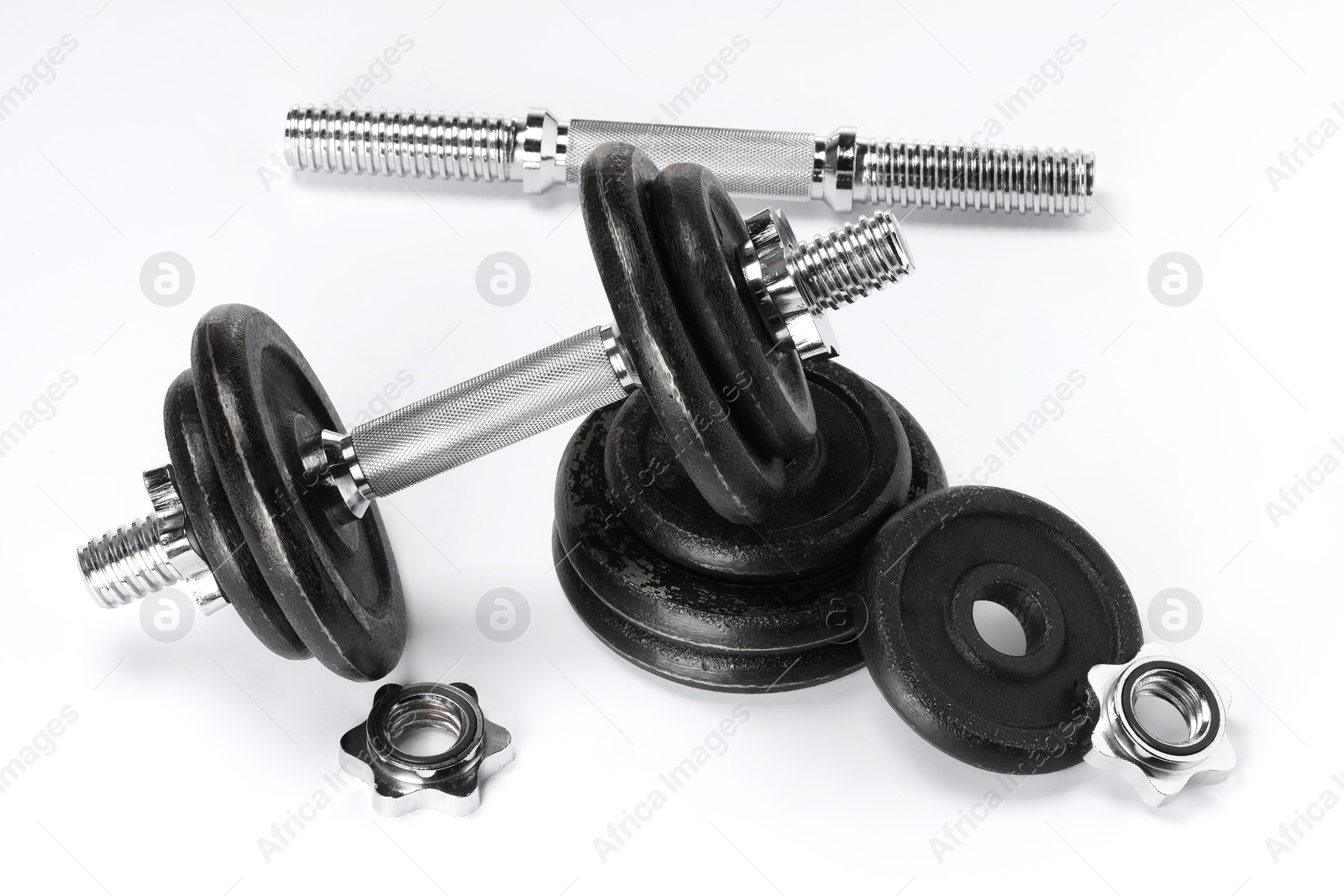 Photo of Barbell and parts of one isolated on white