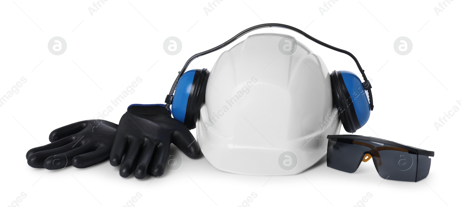 Photo of Hard hat, earmuffs, goggles and gloves isolated on white