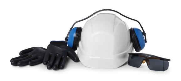 Photo of Hard hat, earmuffs, goggles and gloves isolated on white