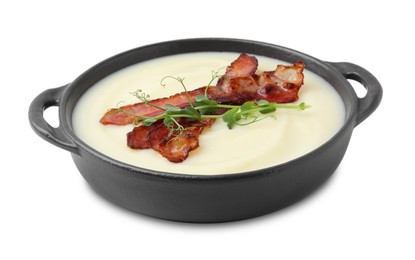 Photo of Delicious potato soup with bacon and microgreens in bowl isolated on white