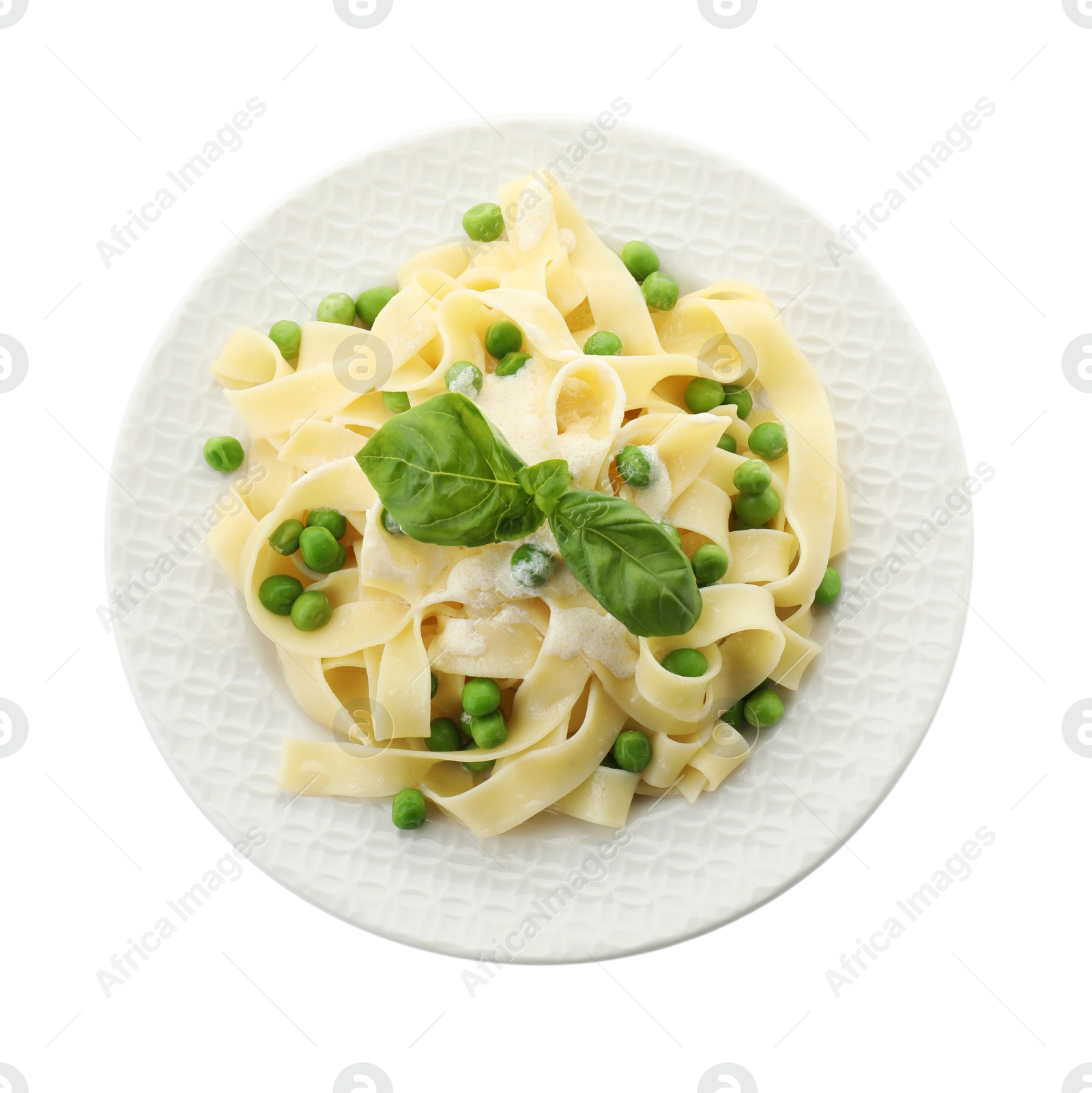 Photo of Delicious pasta with green peas, fresh basil and creamy sauce isolated on white, top view