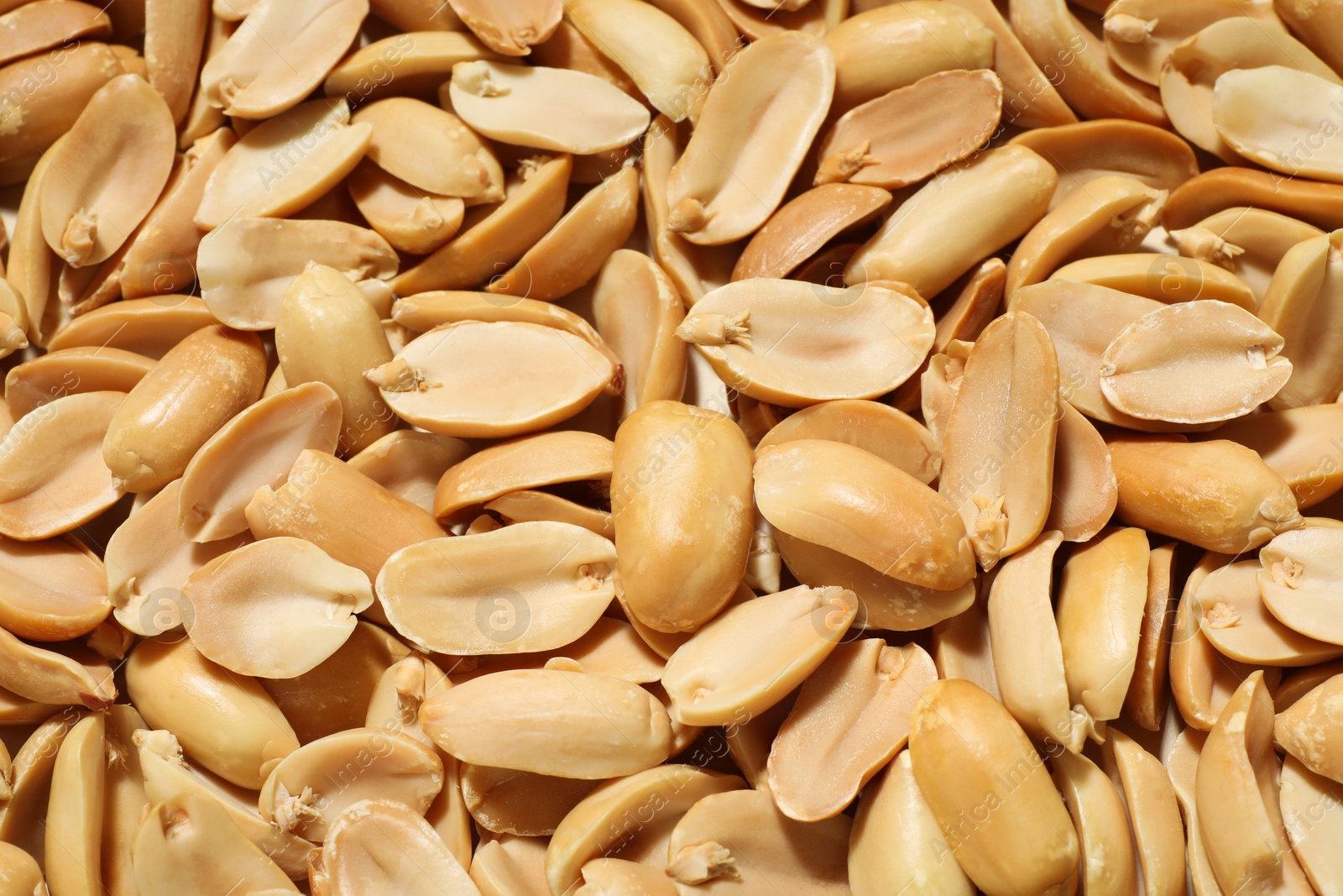 Photo of Fresh peeled peanuts as background, above view