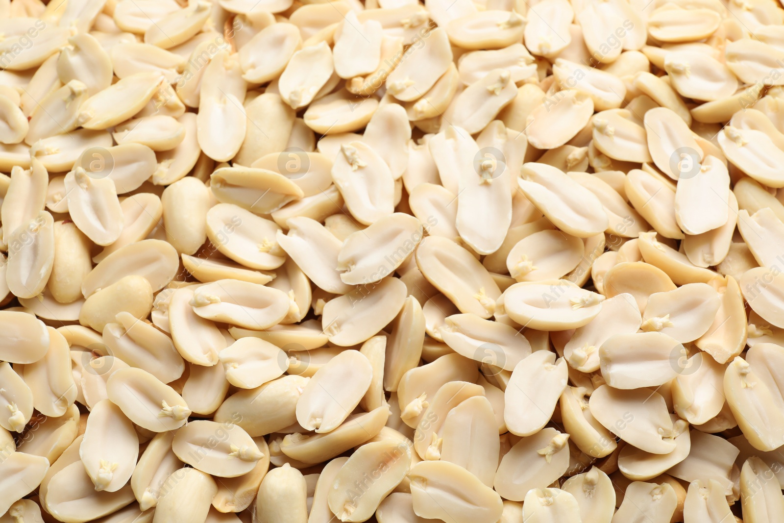 Photo of Fresh peeled peanuts as background, above view