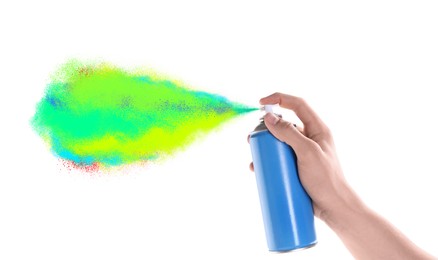 Man spraying colorful paint on white background, closeup