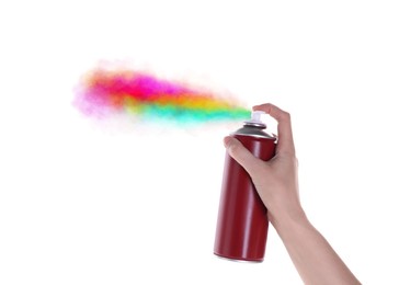 Man spraying colorful paint on white background, closeup