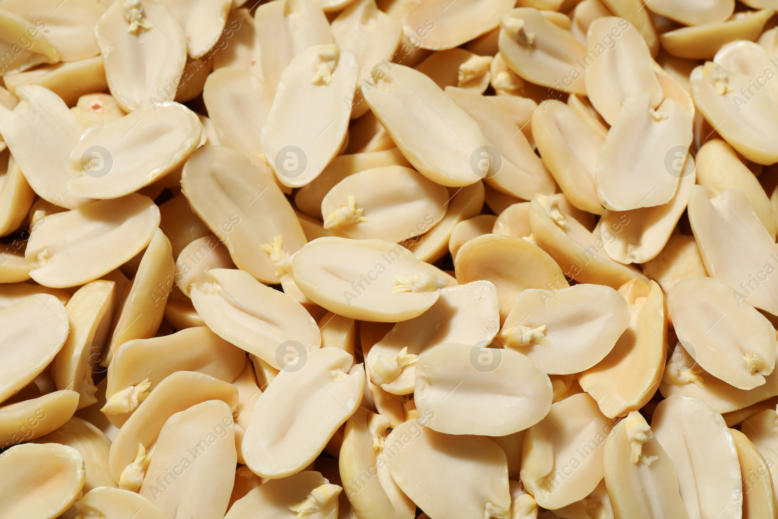 Photo of Fresh peeled peanuts as background, above view