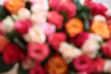 Photo of Beautiful bouquet of colorful roses, blurred view