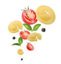 Image of Raw pasta, tomatoes and basil in air on white background