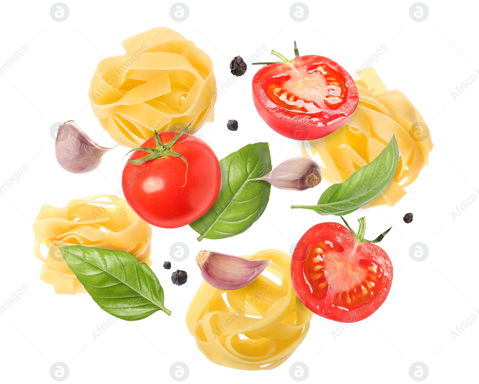 Image of Raw pasta, tomatoes, garlic and basil in air on white background