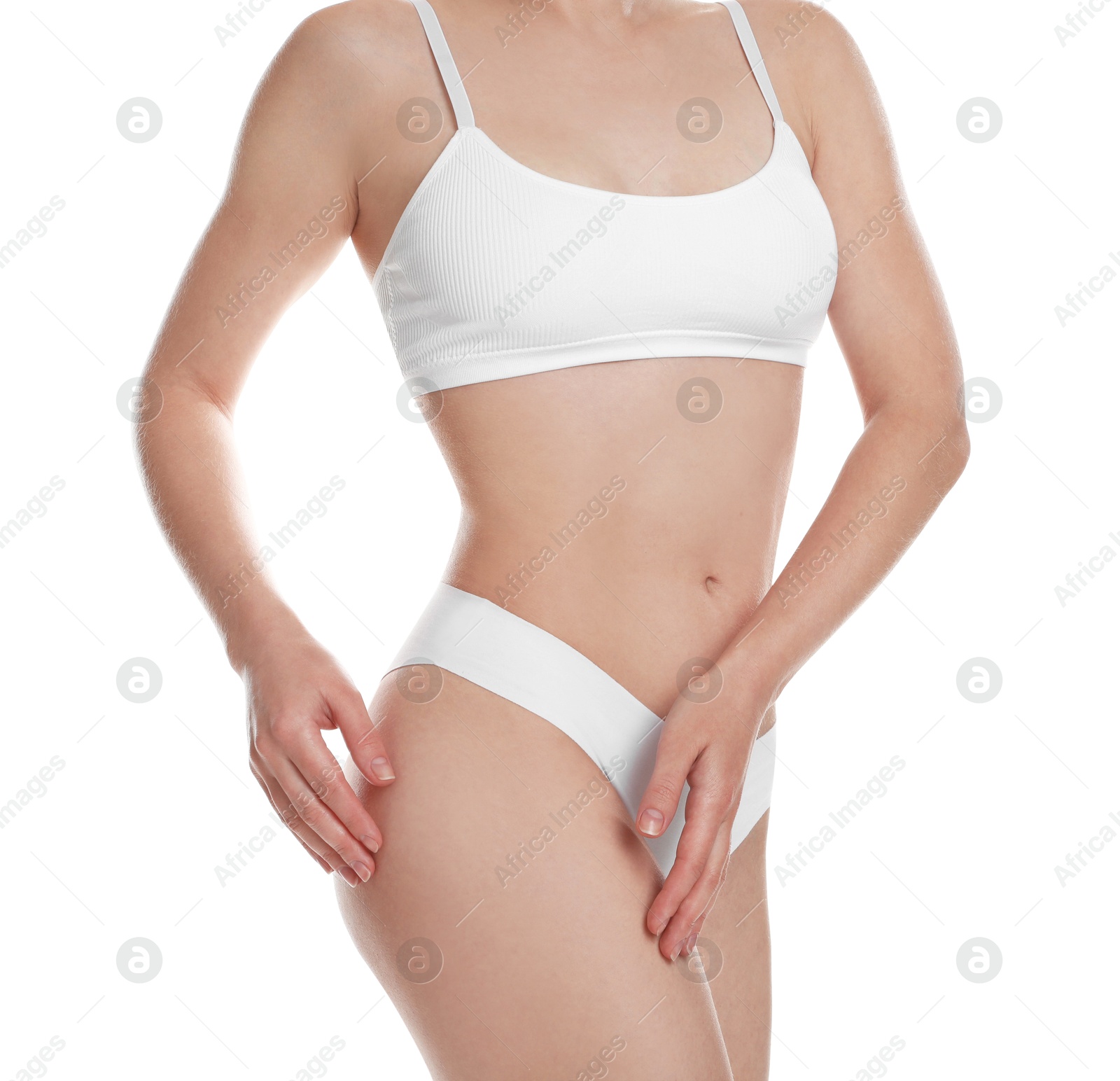 Photo of Woman with slim body posing on white background, closeup