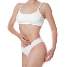 Photo of Woman with slim body posing on white background, closeup