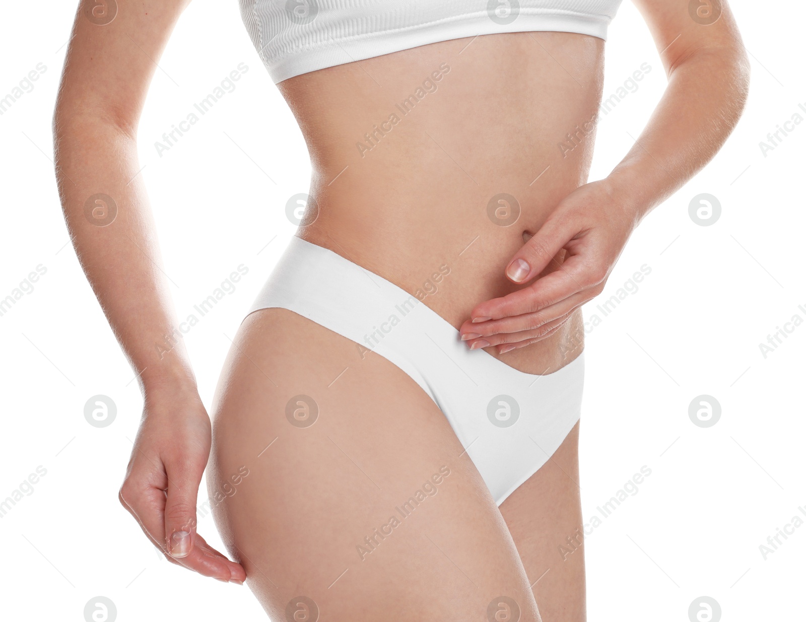 Photo of Woman with slim body posing on white background, closeup