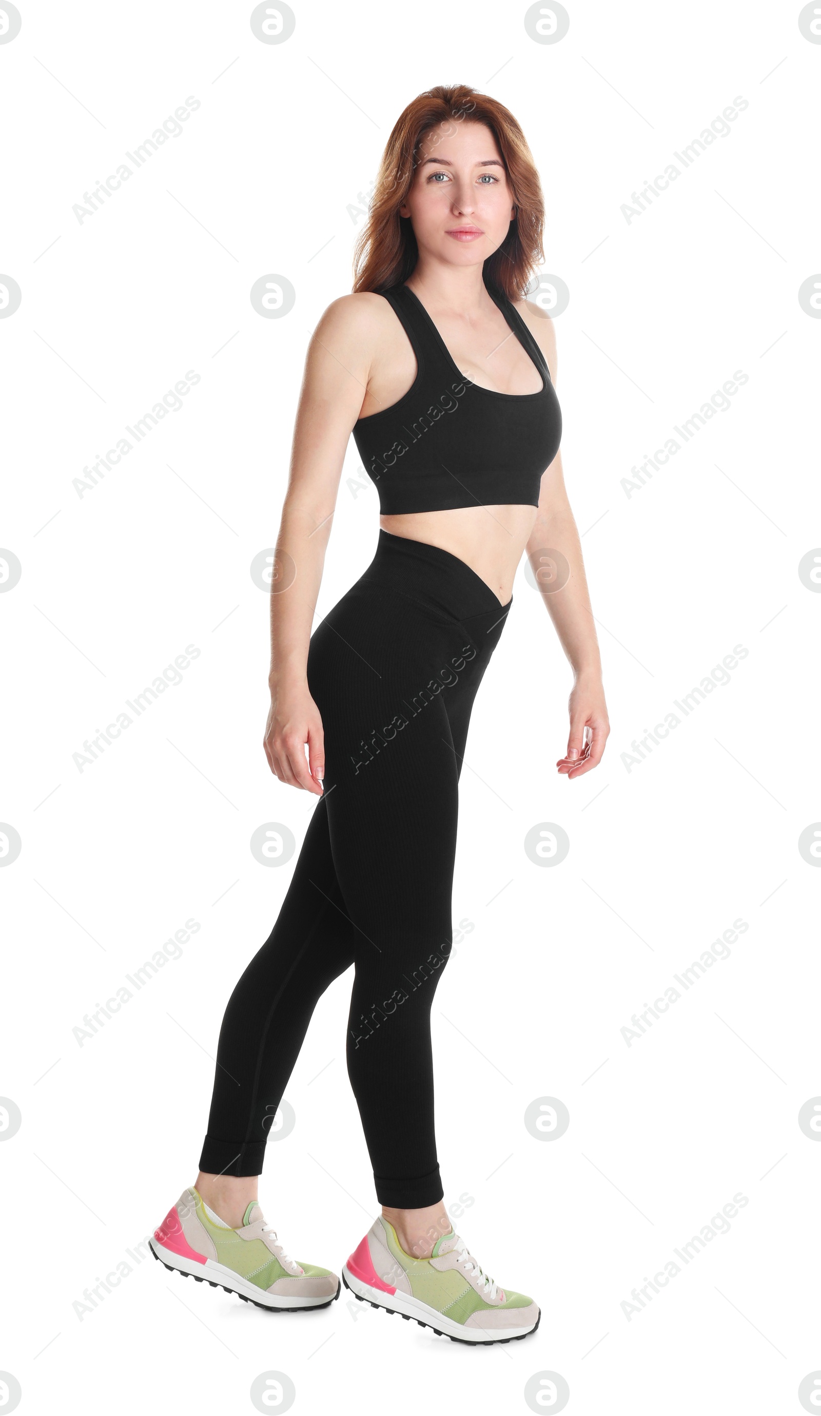 Photo of Woman with slim body posing on white background