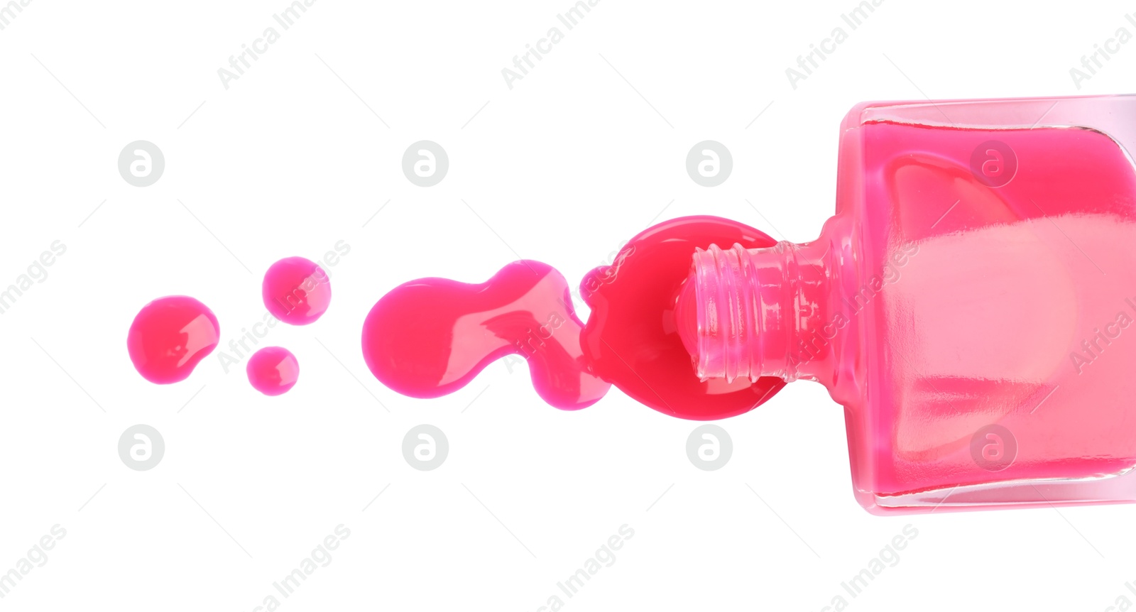 Photo of Bottle and spilled pink nail polish isolated on white, top view