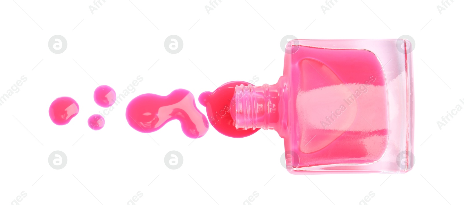 Photo of Bottle and spilled pink nail polish isolated on white, top view