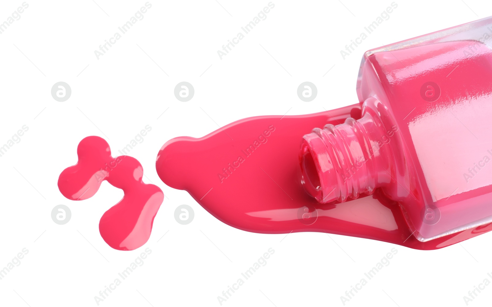 Photo of Bottle and spilled pink nail polish isolated on white, above view