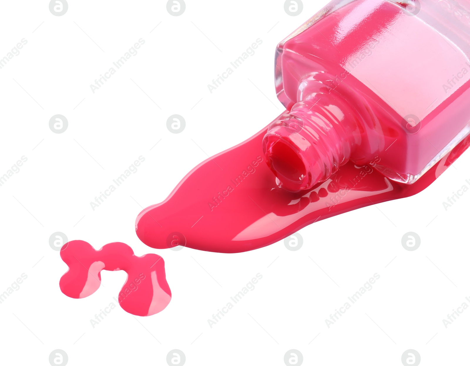 Photo of Bottle and spilled pink nail polish isolated on white