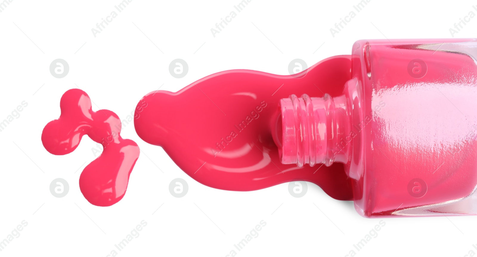 Photo of Bottle and spilled pink nail polish isolated on white, top view