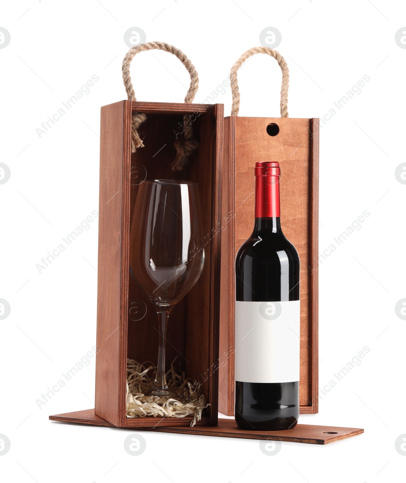 Photo of Wooden gift boxes with wine and glass isolated on white