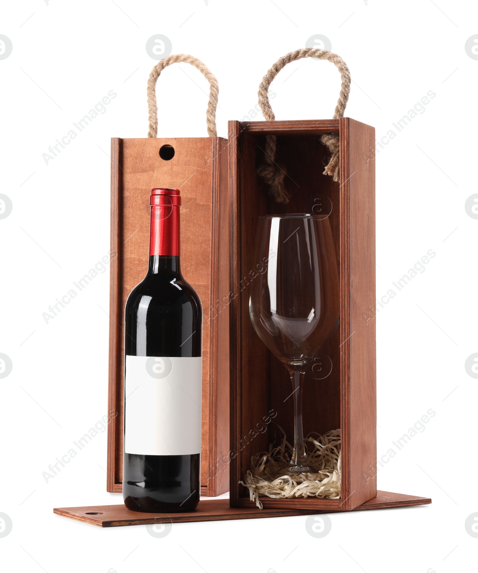 Photo of Wooden gift boxes with wine and glass isolated on white