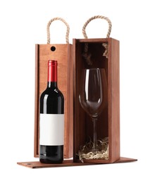 Photo of Wooden gift boxes with wine and glass isolated on white