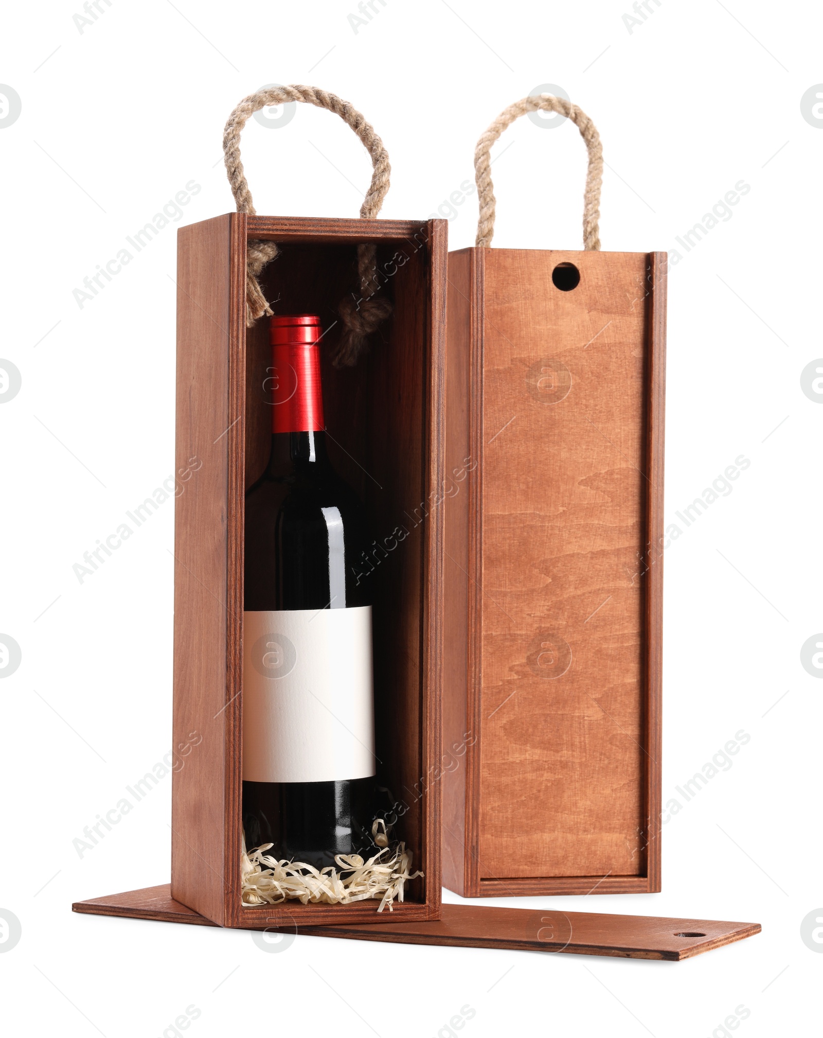 Photo of Wooden gift boxes with wine isolated on white