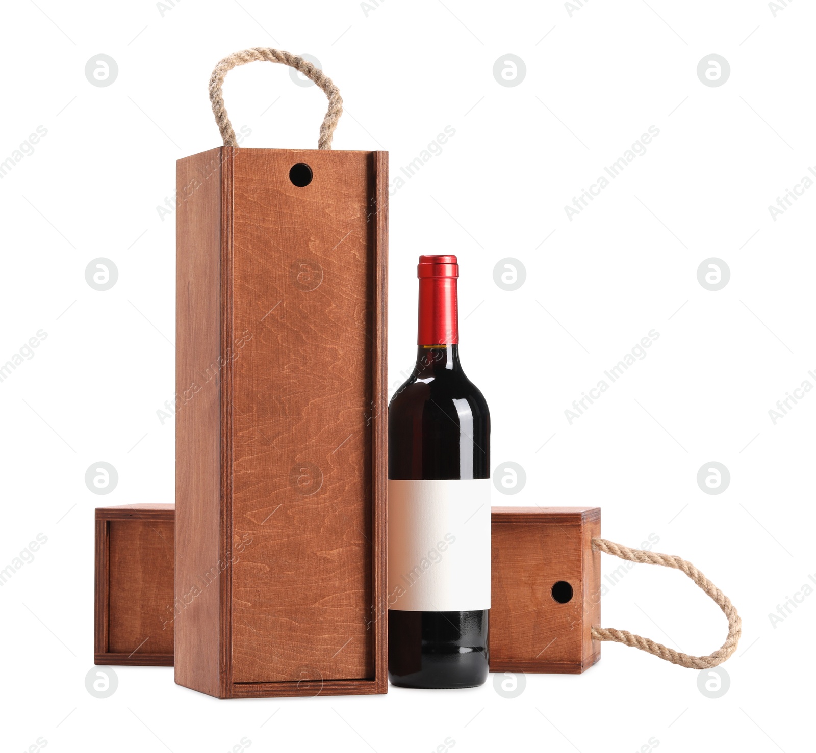 Photo of Wooden gift boxes with wine isolated on white