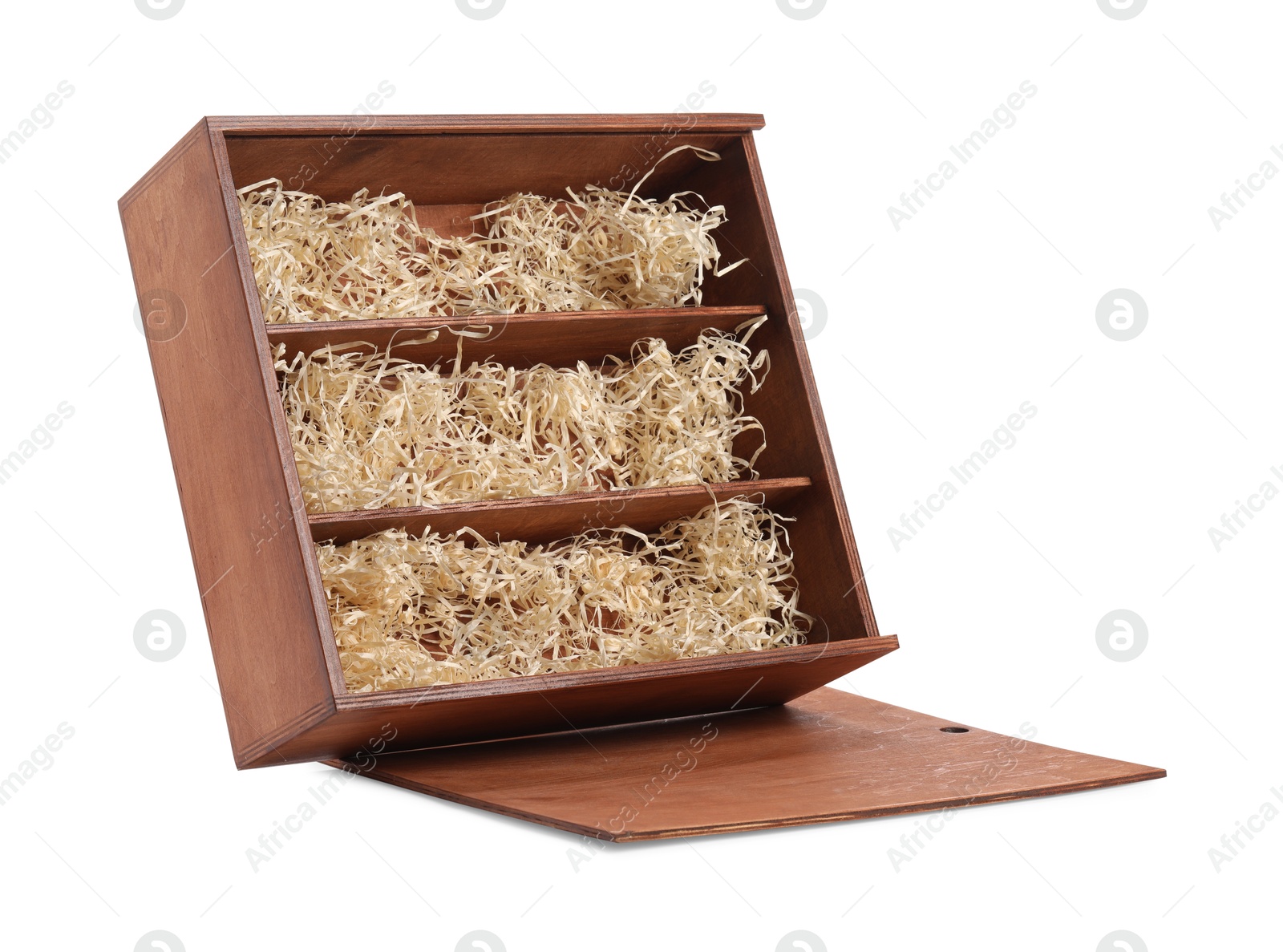 Photo of Open wooden wine box with straw isolated on white