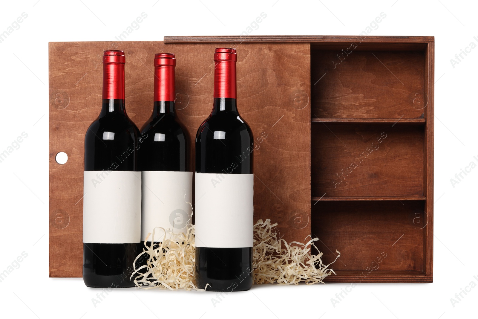 Photo of Wooden gift box with wine bottles isolated on white