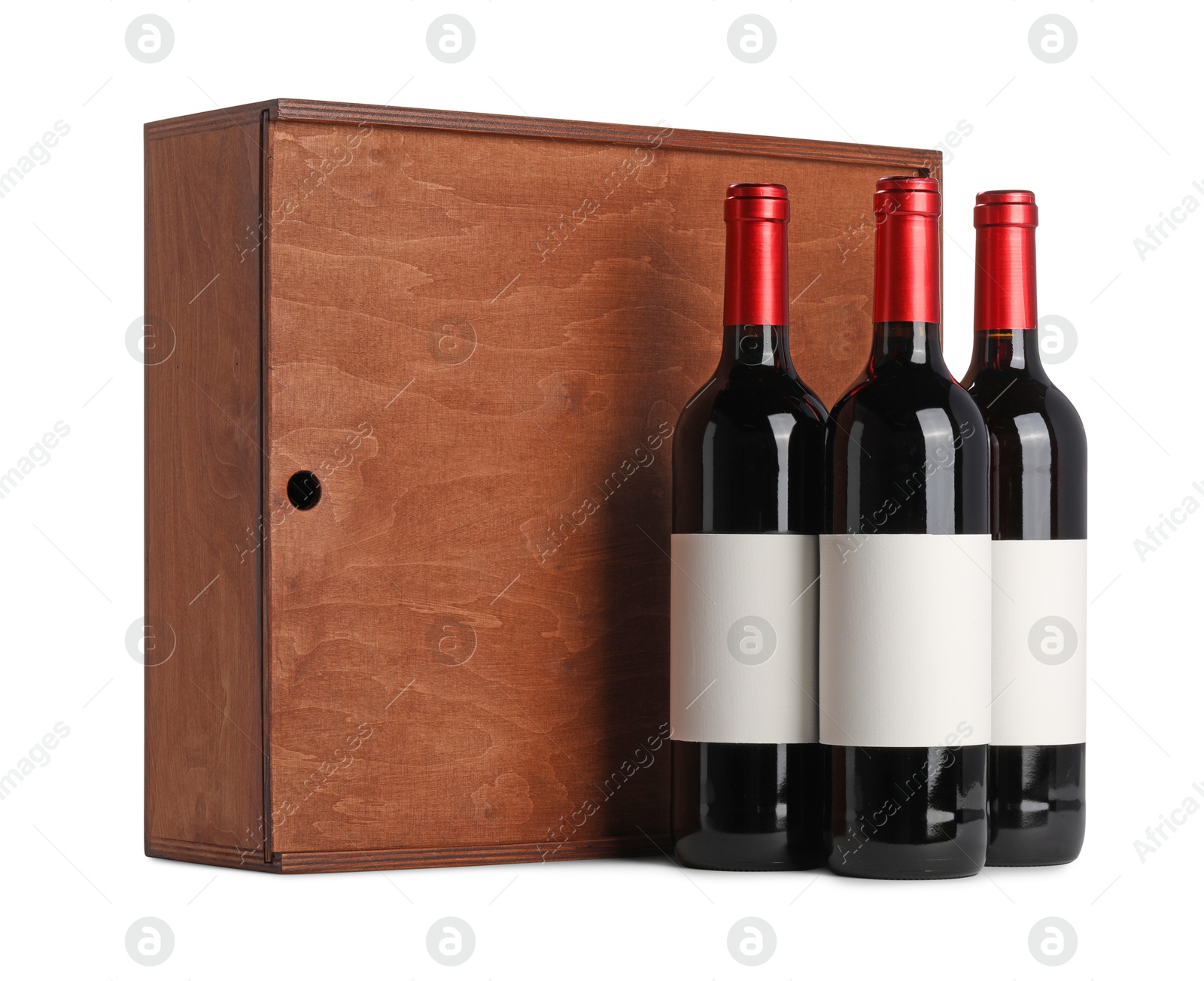 Photo of Wooden gift box with wine bottles isolated on white