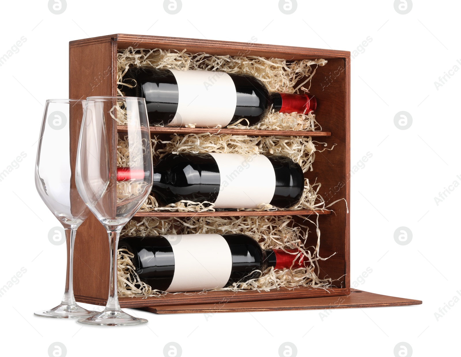 Photo of Wooden gift box with wine bottles and glasses isolated on white