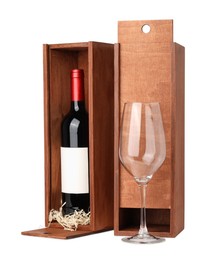 Wooden gift boxes with wine and glass isolated on white
