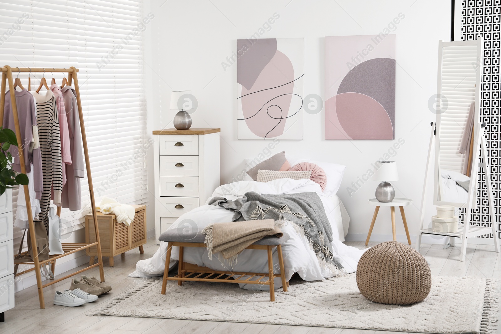 Photo of Teen's room interior with modern furniture and beautiful pictures on wall