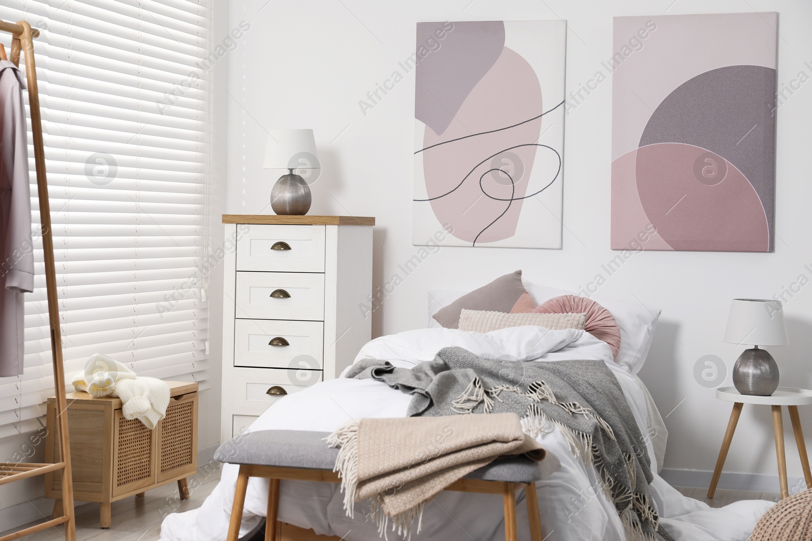 Photo of Teen's room interior with modern furniture and beautiful pictures on wall